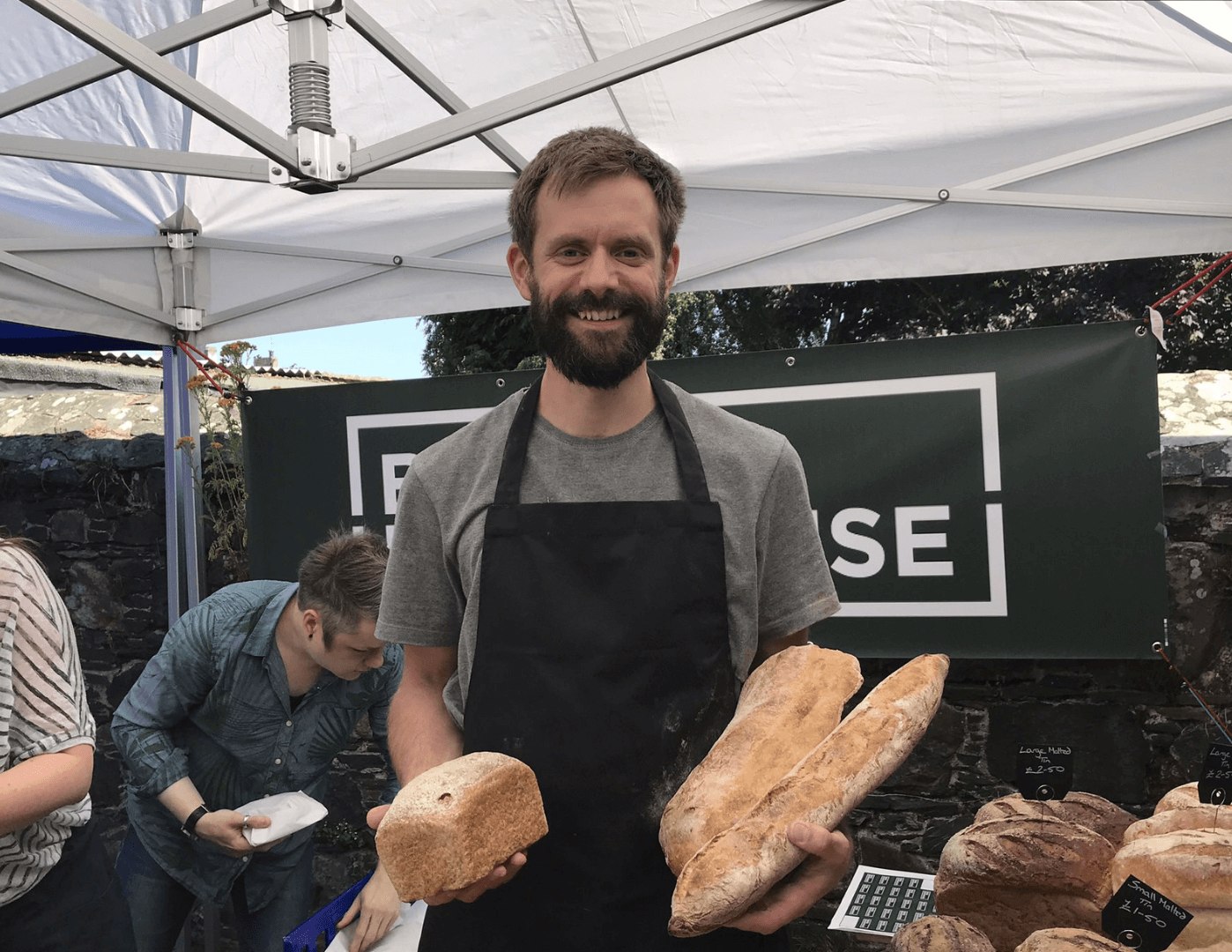 Baker man holding bread